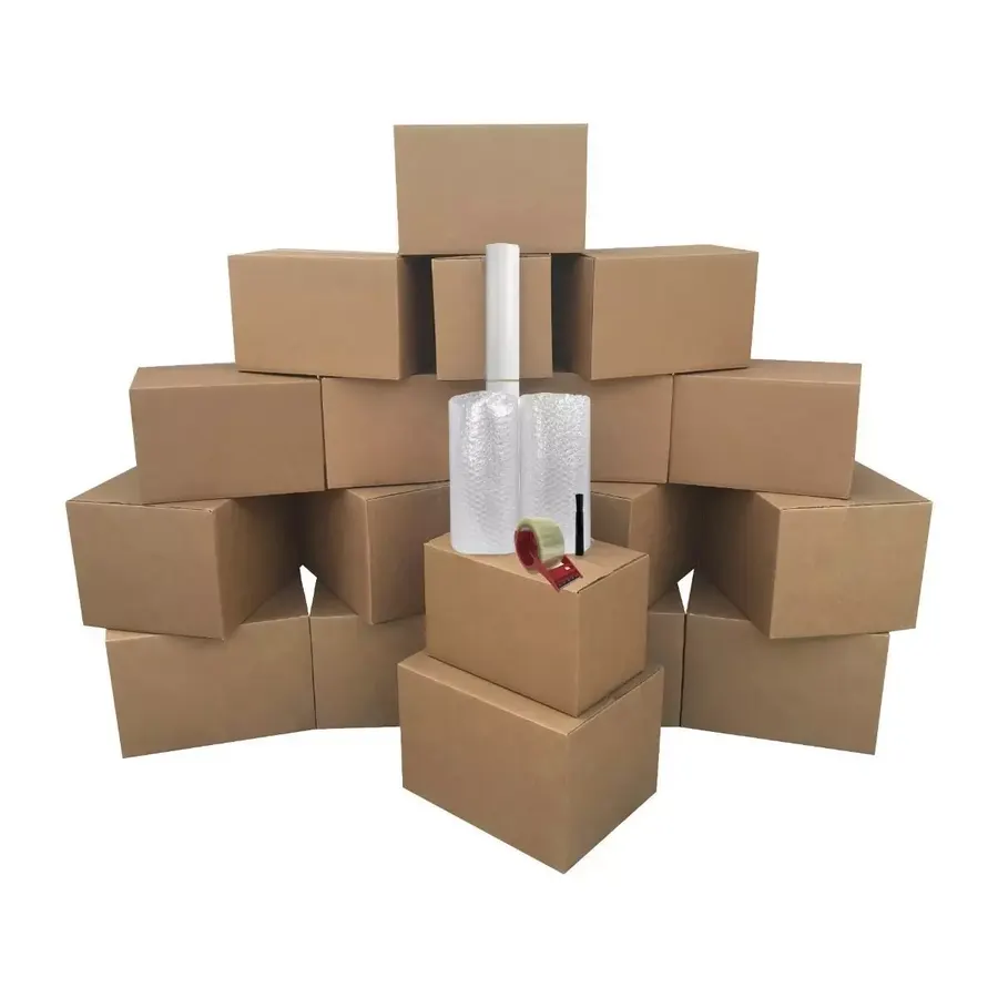Flat-packed bundle of brown corrugated moving boxes with packing supplies