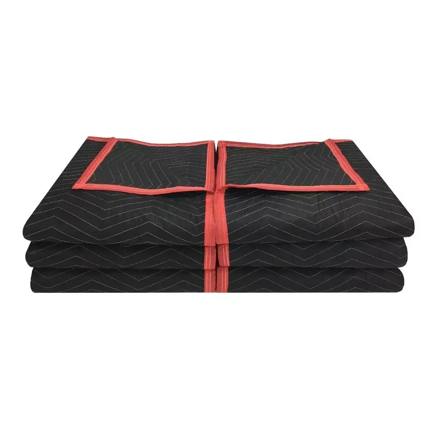 Six black quilted deluxe moving blankets stacked together
