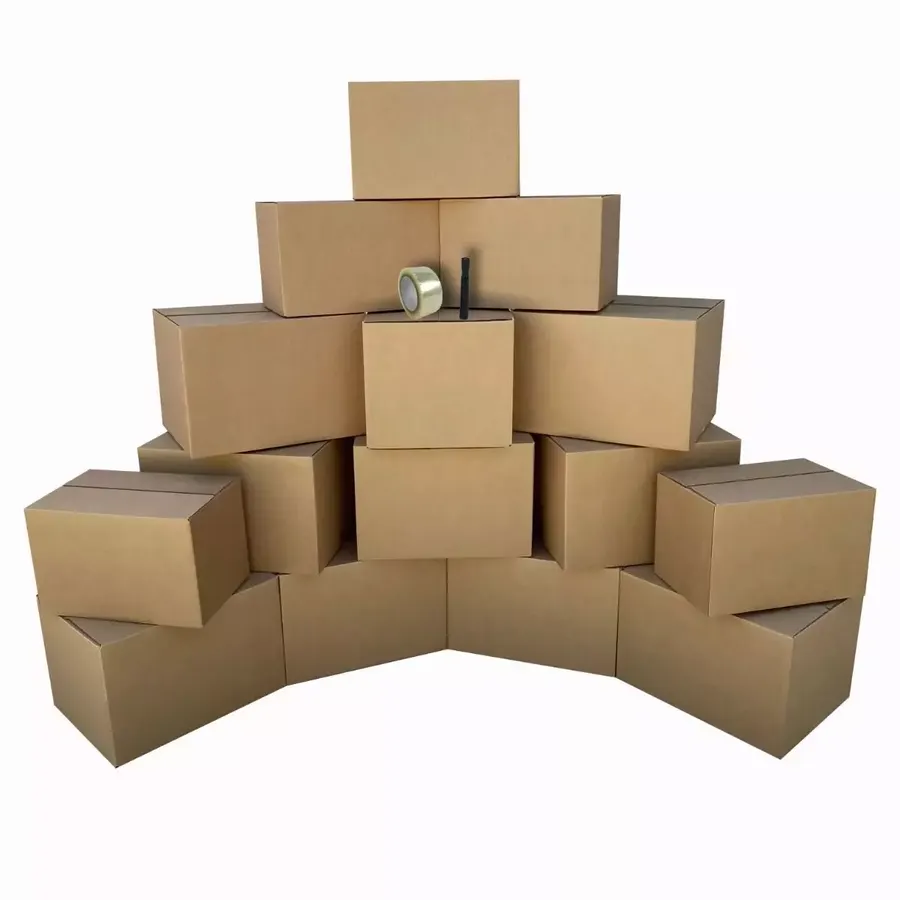 Stack of small and medium brown cardboard moving boxes with tape roll and marker