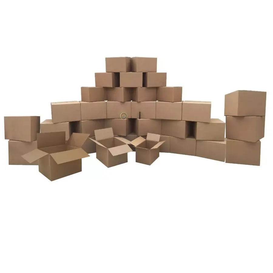 Bundle of brown cardboard moving boxes with packing supplies