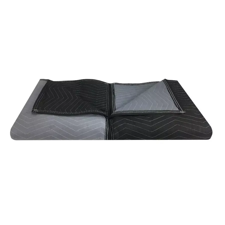 Two black heavyweight polyester moving blankets folded in a stack