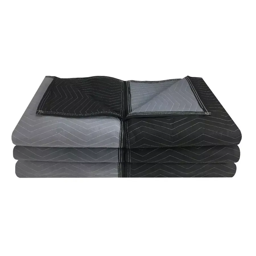 Six black heavyweight polyester moving blankets stacked and folded
