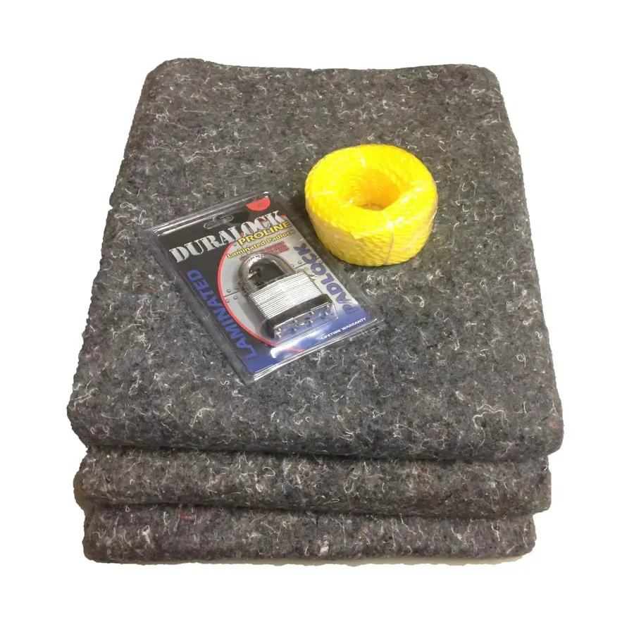 Stack of 24 multicolor textile moving blankets with a coil of nylon rope and a sofa bag