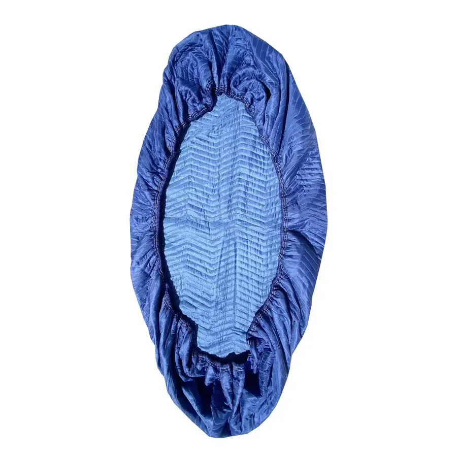Four blue cotton-polyester furniture moving pads folded together