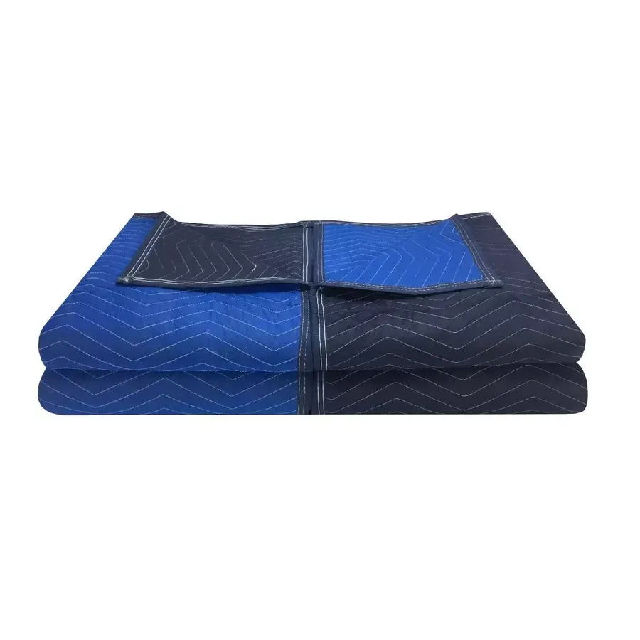 Four blue quilted moving blankets with red trim, stacked