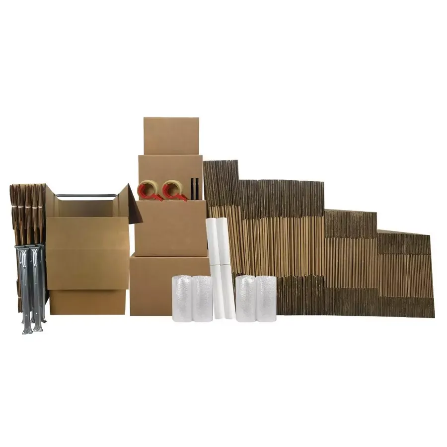 Tall wardrobe moving boxes beside stacked bundles of brown corrugated boxes